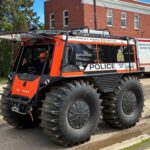 RCMP Search and Rescue FAT TRUCK® parked in front of the Manitoba Disaster Response Team building in Swan River, Manitoba during flood relief operations.