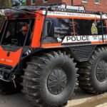 RCMP Search and Rescue FAT TRUCK® parked in front of the Manitoba Disaster Response Team building in Swan River, Manitoba during flood relief operations.